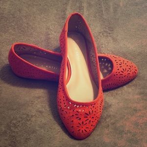 Orange suede flats